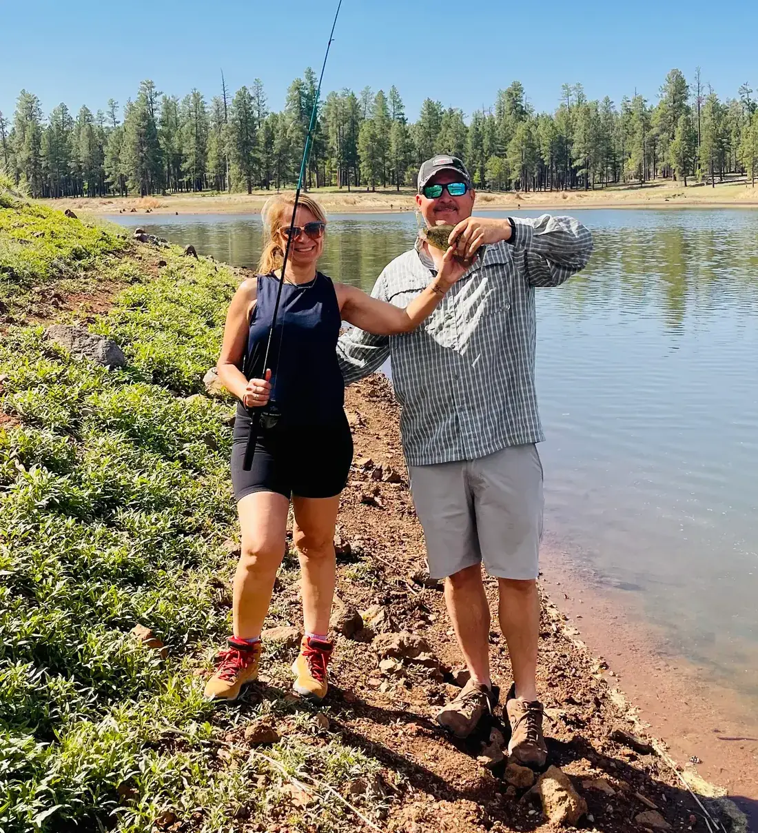 Powell and Cristina fishing at an Arizona mountain lake